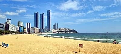 coastal view of Busan South Korea with beach and city skyline