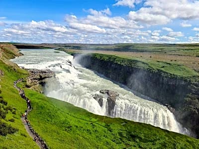 Gullfoss waterfall dropping into its canyon, the final stop on the Golden Circle leg of an iceland itinerary