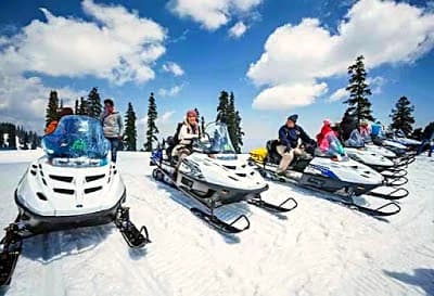 Green mountain meadows at Gulmarg in Jammu and Kashmir on a clear summer day