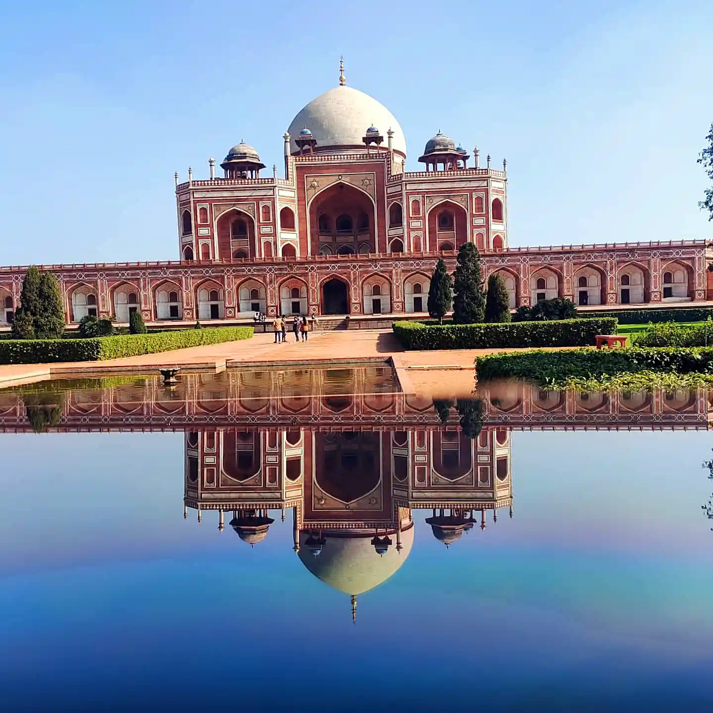 Humayun's Tomb in Delhi under monsoon clouds, a reminder that sightseeing days need buffer too