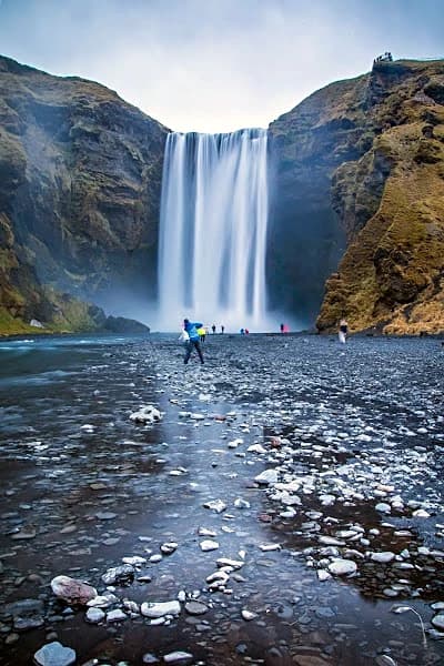 Skogafoss waterfall on Iceland's south coast, the busiest stop before the road empties out