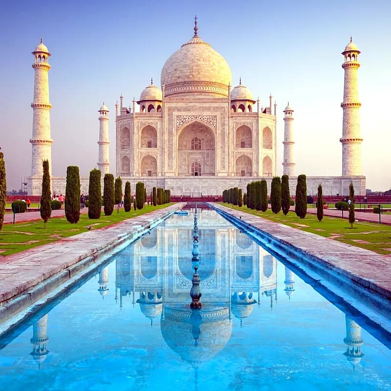 the Taj Mahal at sunrise in Agra India with clear skies