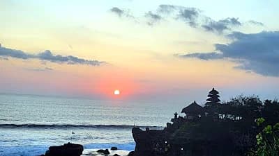 Tanah Lot sea temple at sunset on Bali during an Indonesia trip plan