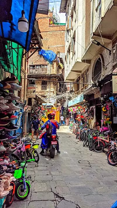 Thamel neighbourhood in Kathmandu where trekkers arrange permits and gear before heading into the hills