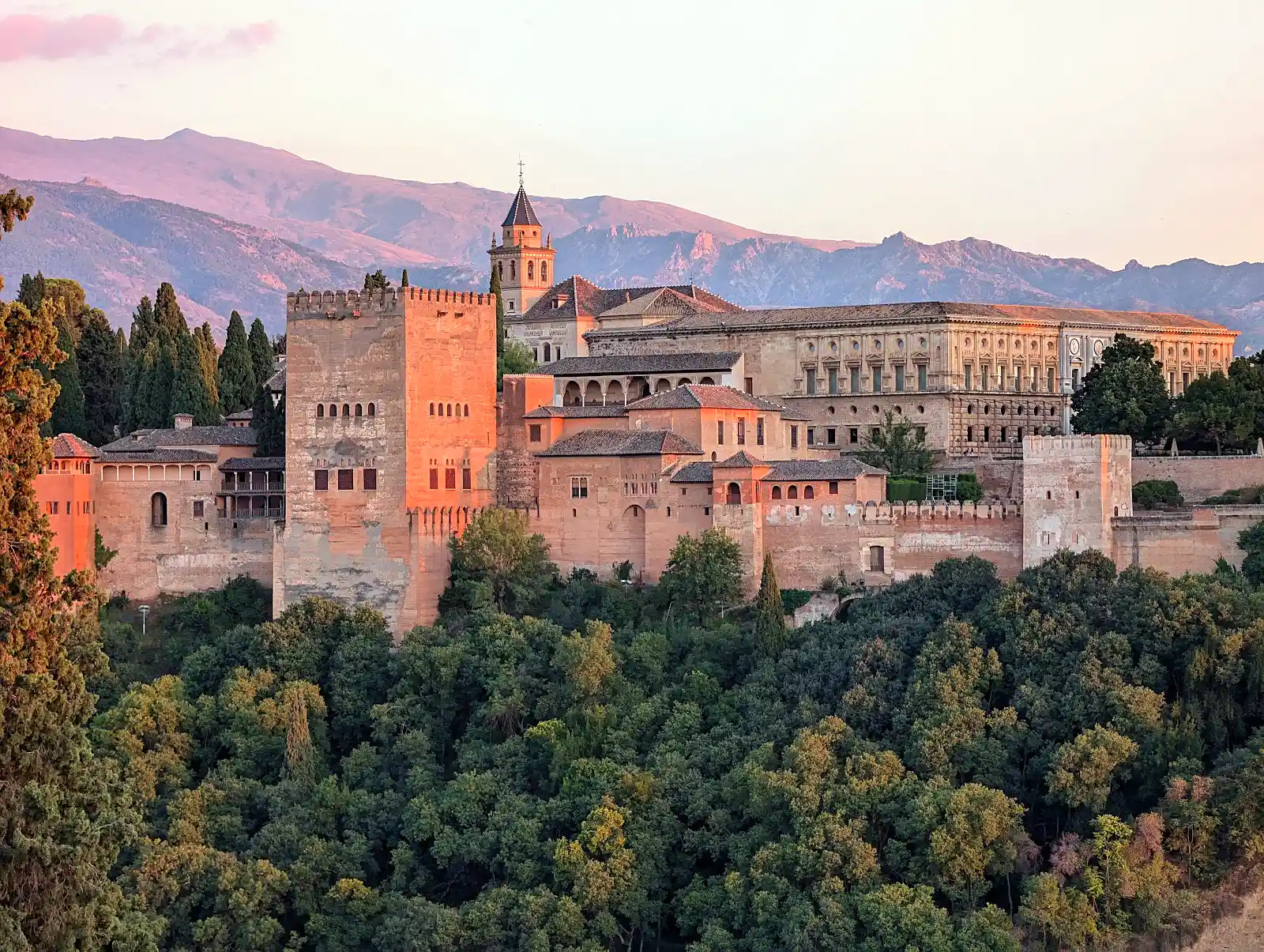 Alhambra palace complex in Granada Spain with intricate Moorish architecture and gardens