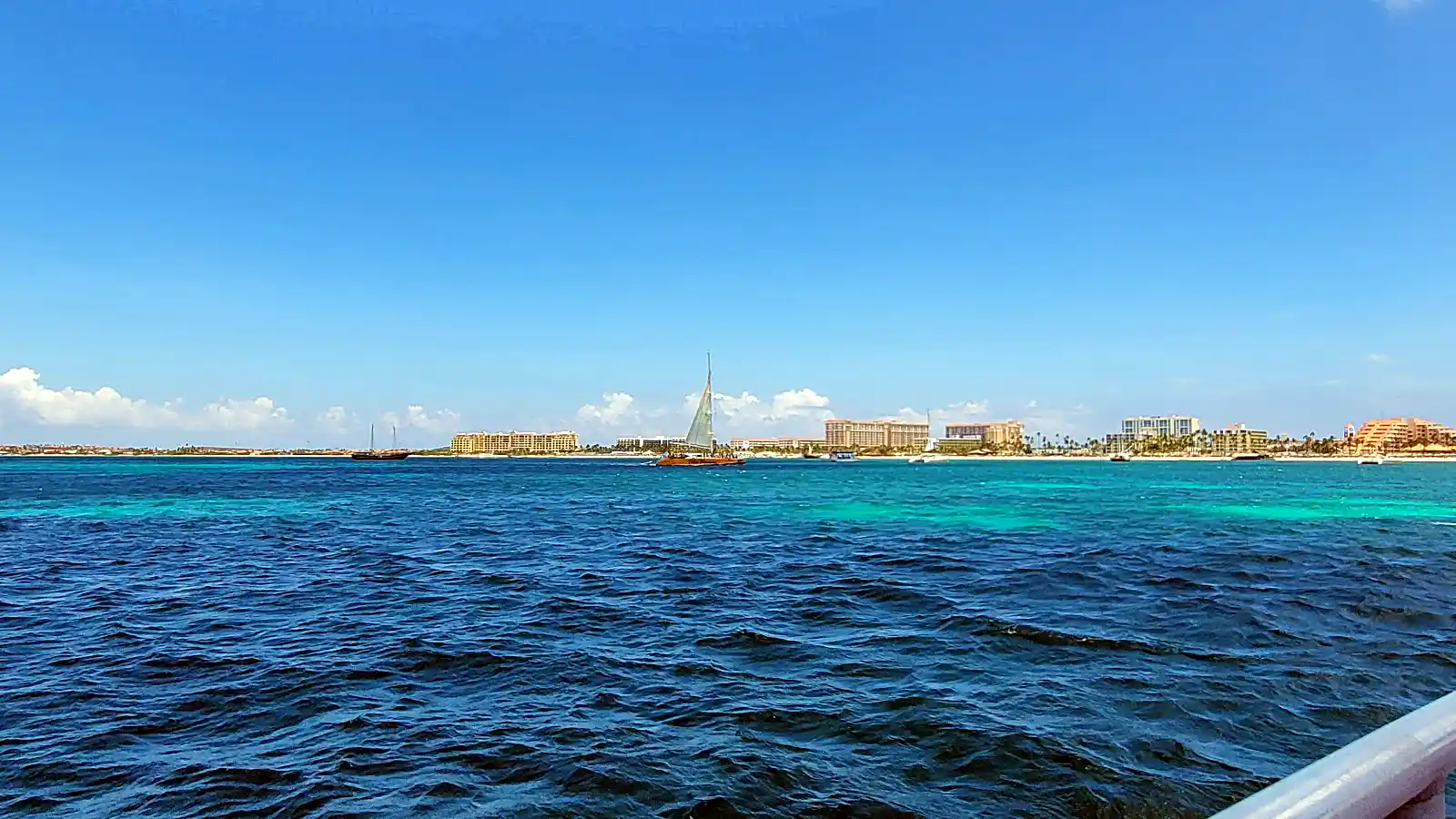 calm beach and turquoise water in Aruba, a southern Caribbean island during hurricane season