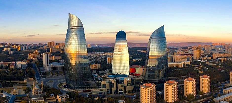 Baku skyline at dusk showing the Flame Towers, starting point for any Azerbaijan itinerary