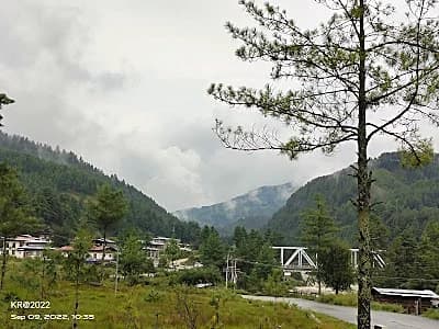 Buckwheat fields and orchards in Bhutan's Bumthang valley, the country's spiritual heartland