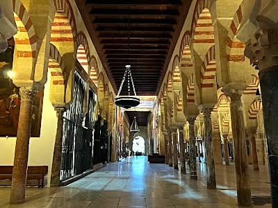 horseshoe arches inside the Mezquita mosque-cathedral in Cordoba Spain