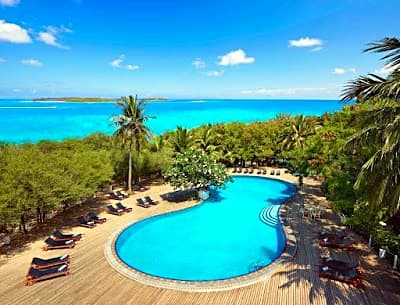 A pristine maldives itinerary setting with turquoise water and white sand beach at Dhonveli
