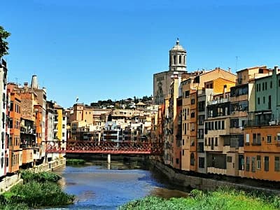 colourful houses along the Onyar river in Girona old town Spain