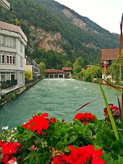 Interlaken town with the Eiger Mönch and Jungfrau mountain peaks in the background Switzerland