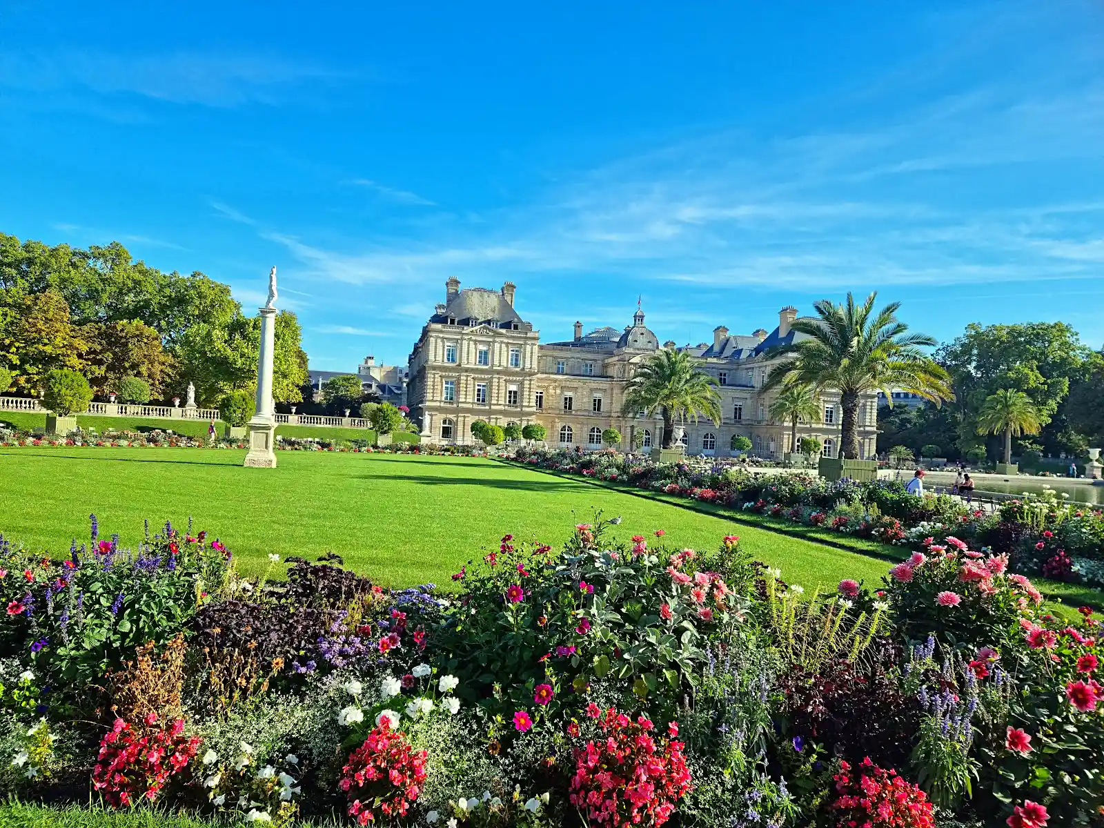 Chairs and trees in the Jardin du Luxembourg in Paris on a quiet day