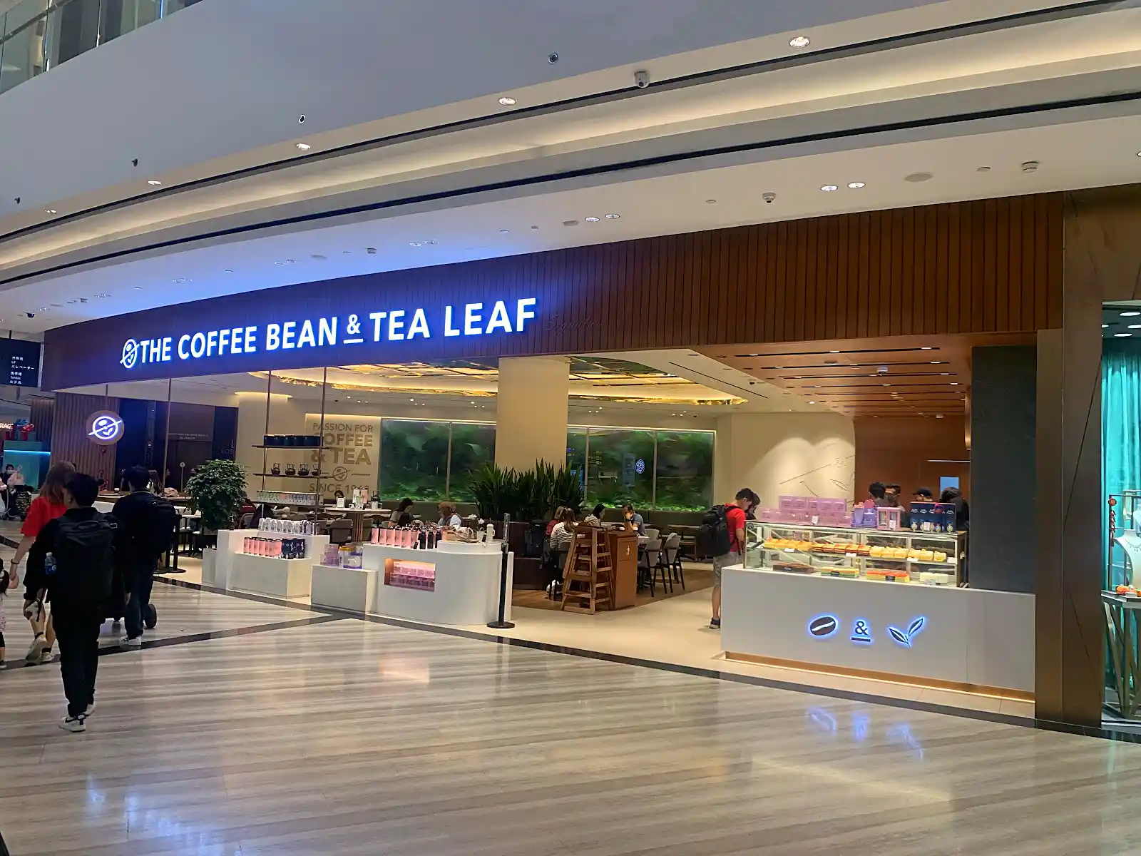 travellers at Jewel Changi Airport Singapore preparing for international travel