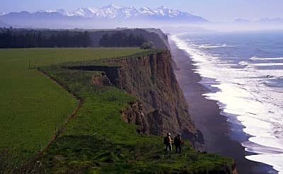 coastal cliffs and ocean at Kaikoura New Zealand, known for year-round whale watching
