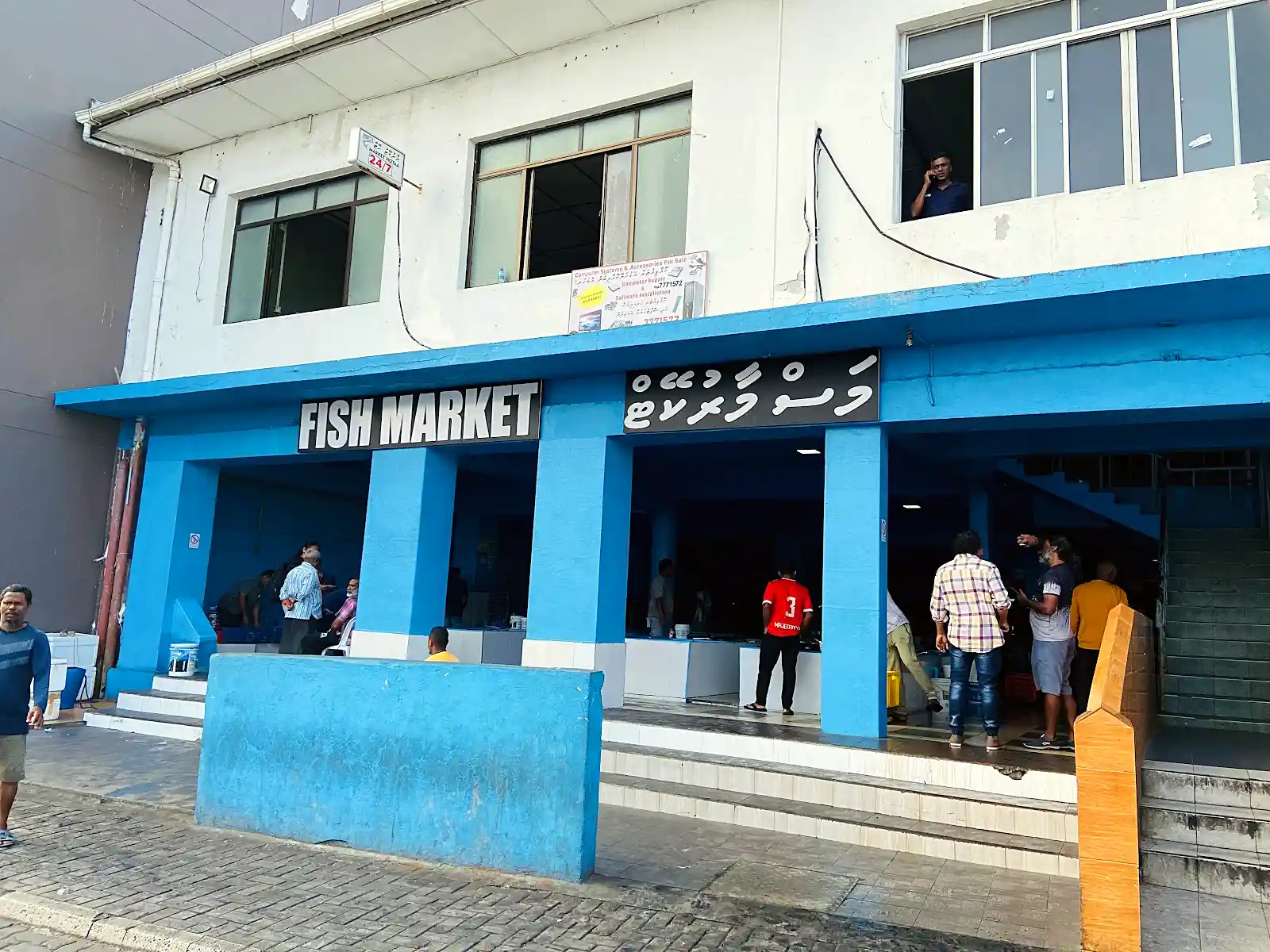 vendors selling fresh tuna at Male fish market, a stop before visiting Maldives local islands
