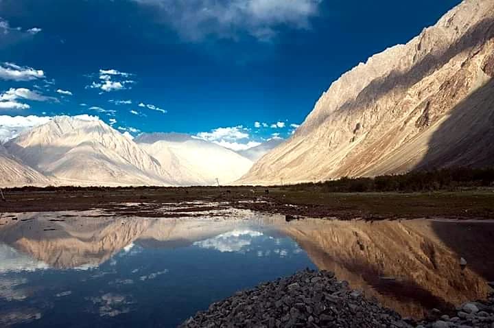 Sand dunes and Bactrian camels in Nubra Valley Ladakh, an overnight excursion from Leh via Khardung La