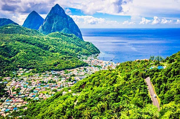 The Pitons rising above the coast, the classic image behind every caribbean trip plan