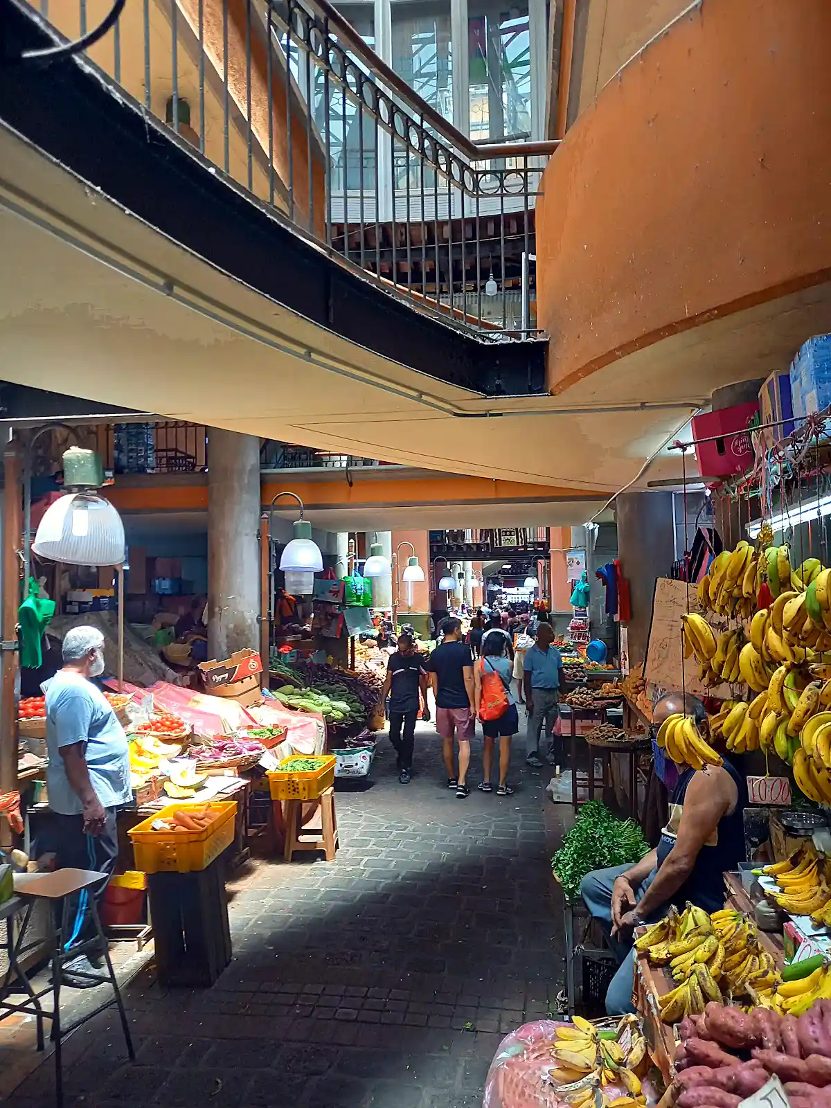 Spice stalls and fresh produce at Port Louis Central Market in Mauritius