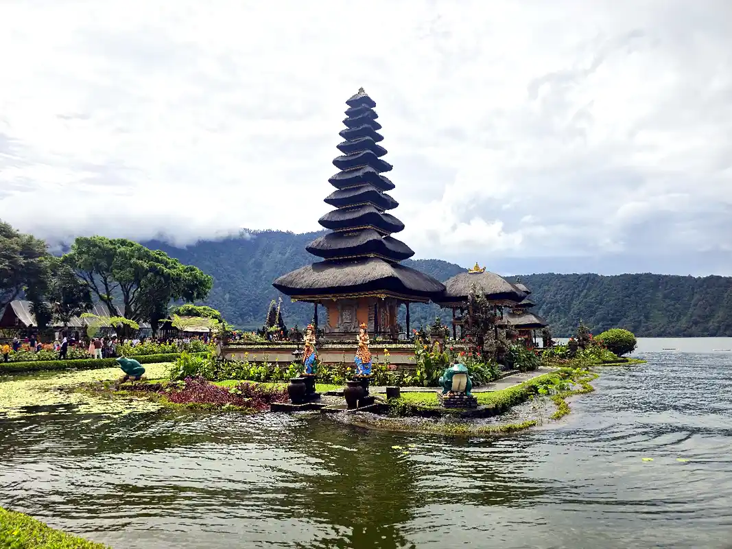 Pura Ulun Danu Bratan lake temple Bali Indonesia reflected in calm water at dawn