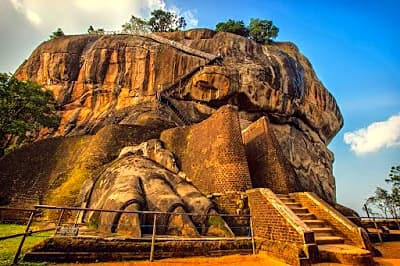 Sigiriya Rock Fortress rising above jungle in Sri Lanka, unmissable sri lanka itinerary landmark