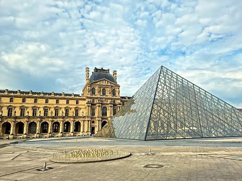 The Louvre Museum glass pyramid in Paris, now priced differently for Indian tourists