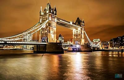 tower bridge lit up over the thames, the starting point for most london trip plan itineraries